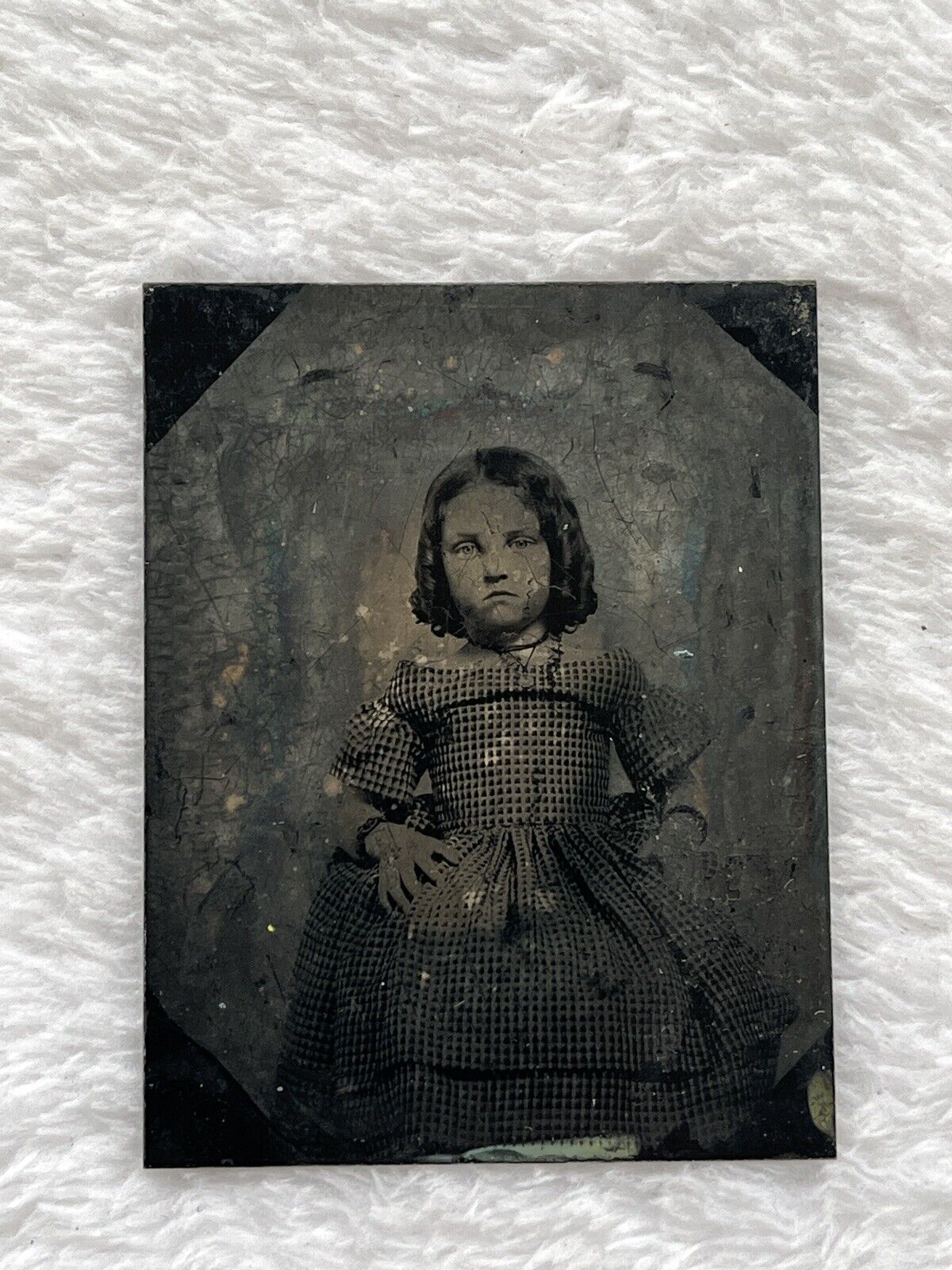 tintype of pretty young girl with amazing hair braids polka dots dress