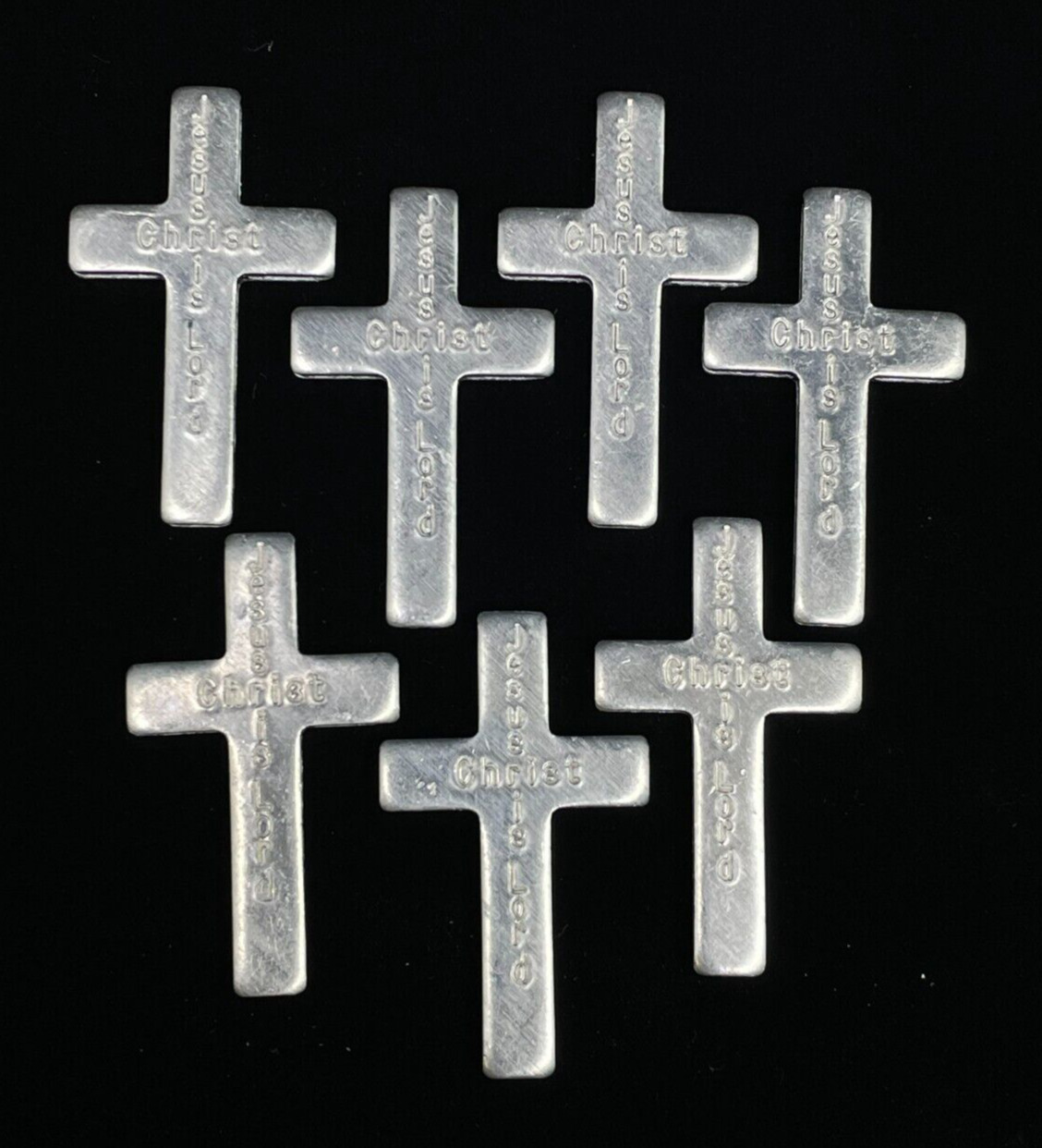 Lot of Seven Pocket Cross Jesus Christ is Lord Aluminum