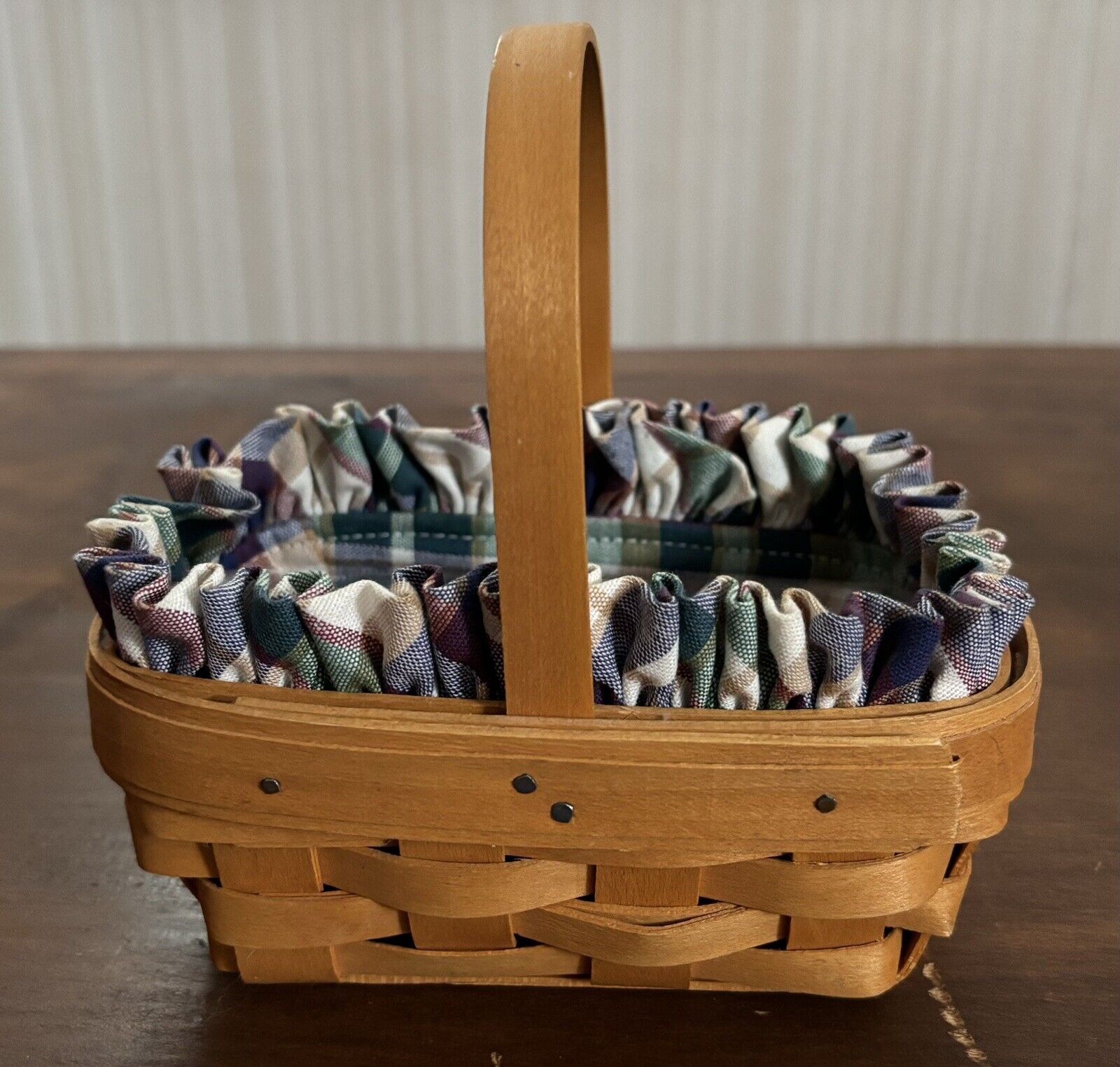 Preowned VINTAGE 2001 Longaberger Basket With Multicolored Liner.