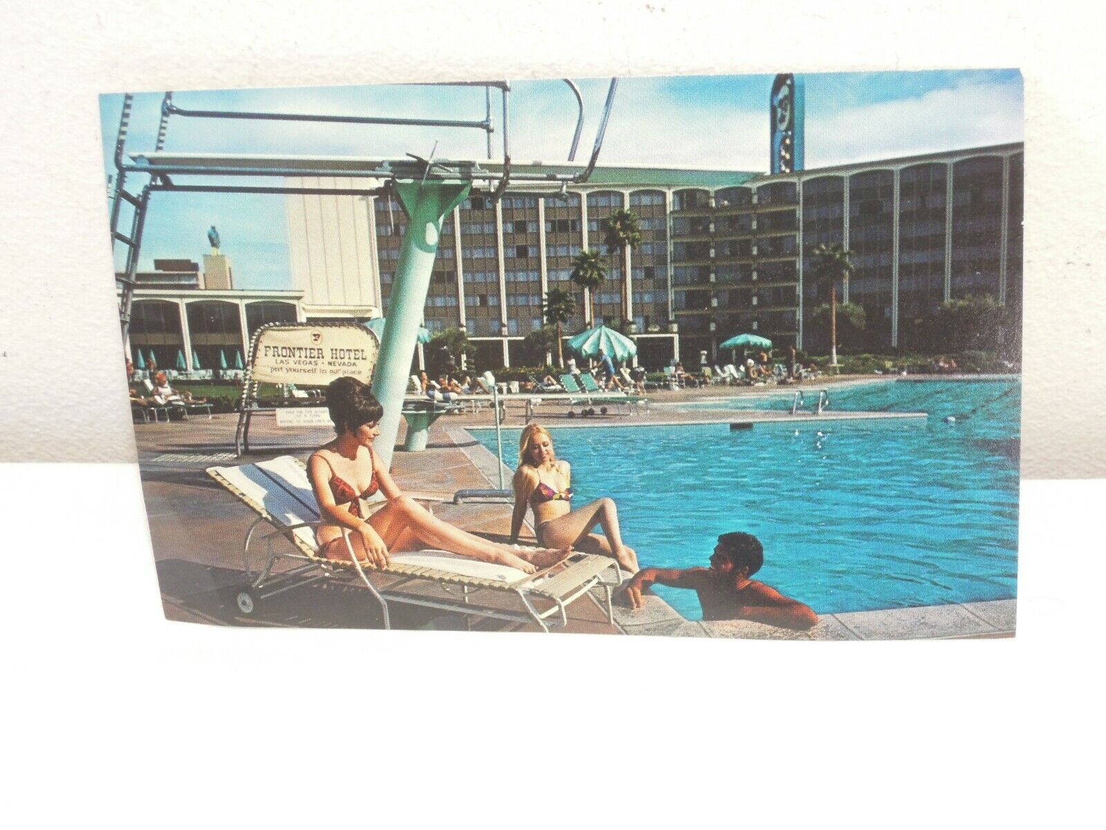 Frontier Hotel Las Vegas chrome postcard poolside view