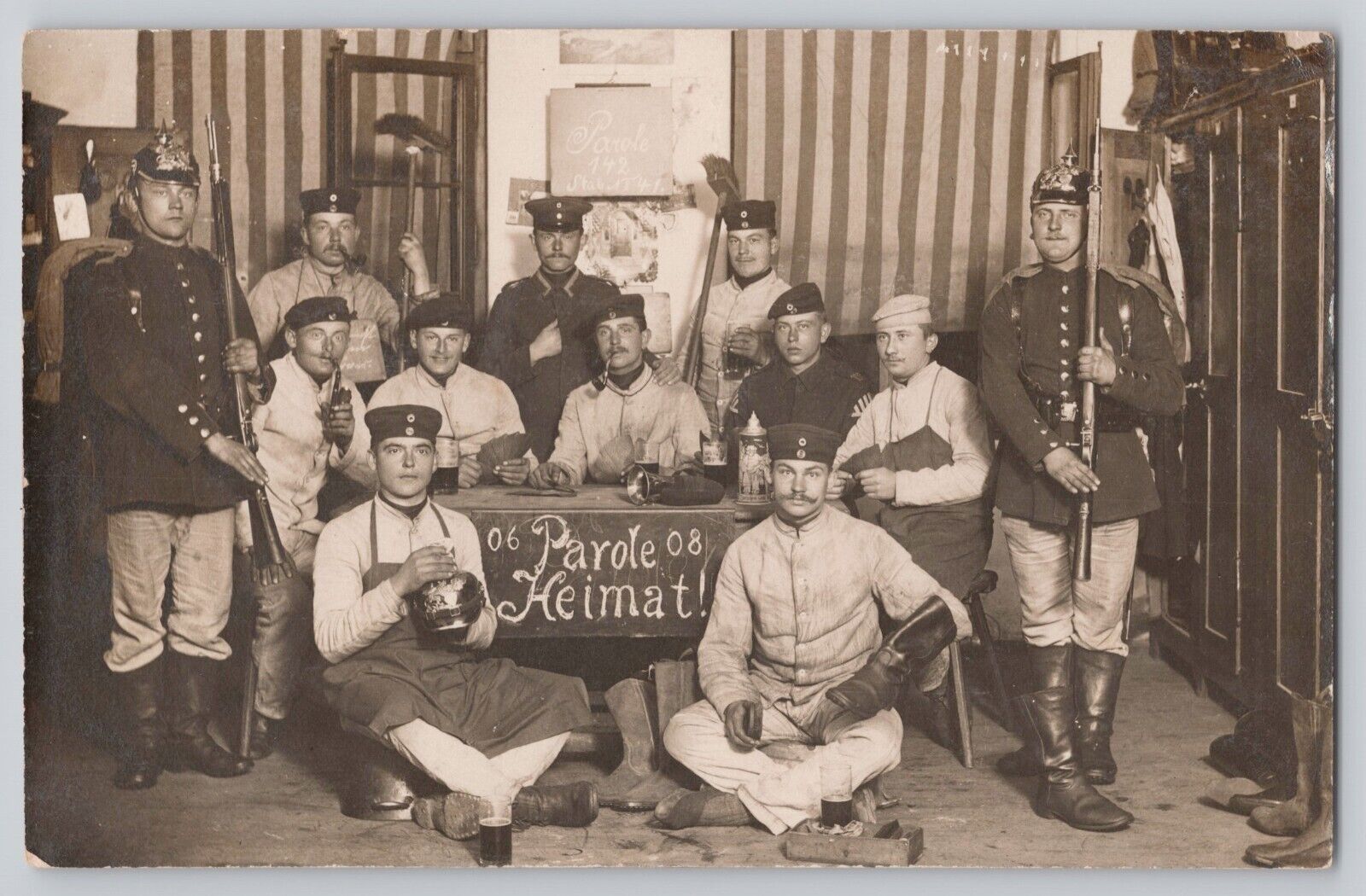 WWI RPPC German Soldiers Barracks Foolery Postcard Flags & Helmets
