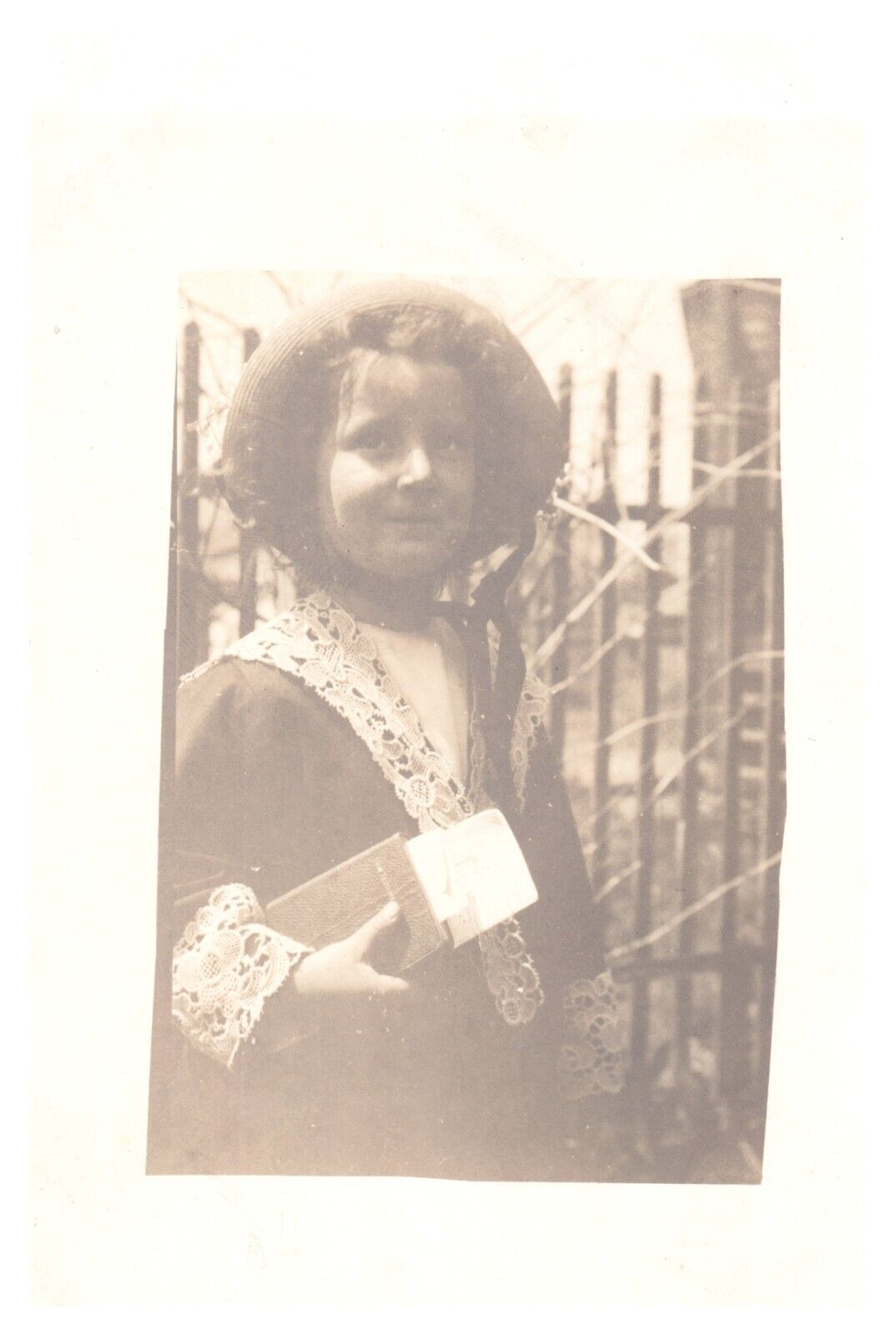 Vintage Real Photo Post Card Self portrait of child with book bible 1900s UP