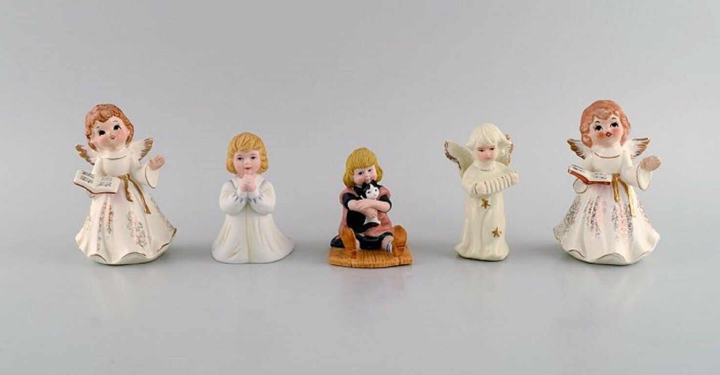 Five porcelain figurines. Angels and children. 1980s.