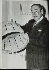 1954 Press Photo Actor Adolphe Menjou, Holding Basket - hpp29802 picture