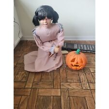Spirit Halloween girl Carver animated life-size Halloween prop lawn decor picture