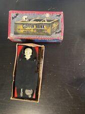 Vintage YONE Skeleton Coffin Coin Bank Wind Up Tin Toy made in Japan In Box 60’s picture
