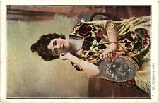 Vintage Postcard- A woman sitting Early 1900s picture