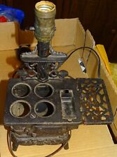 Miniature Antique Cast Iron Crescent Stove Lamp picture