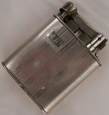 Vintage Reliance Big benzine Lighter made in ocuppied Japan 99 mm. x 72 mm.  picture