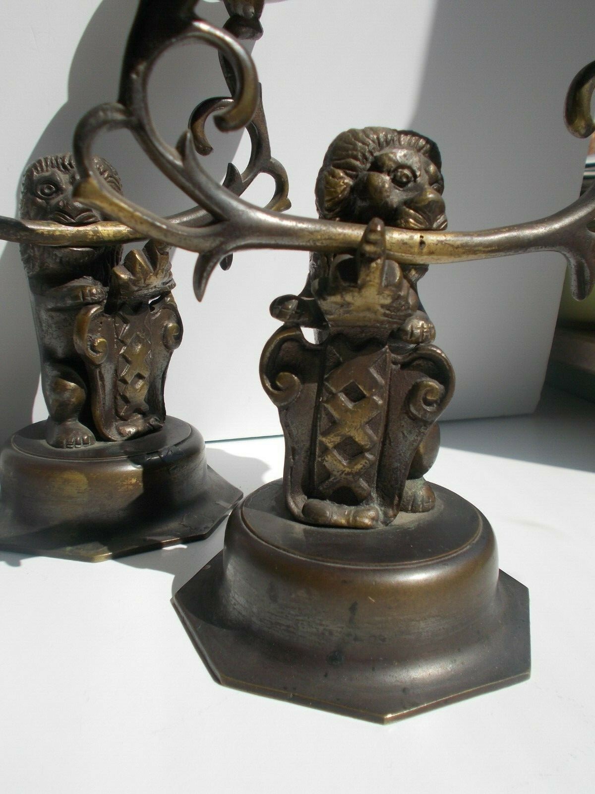 Pair Antique Bronze Candelabras Lions Holding Coat of Arms 19th century 
