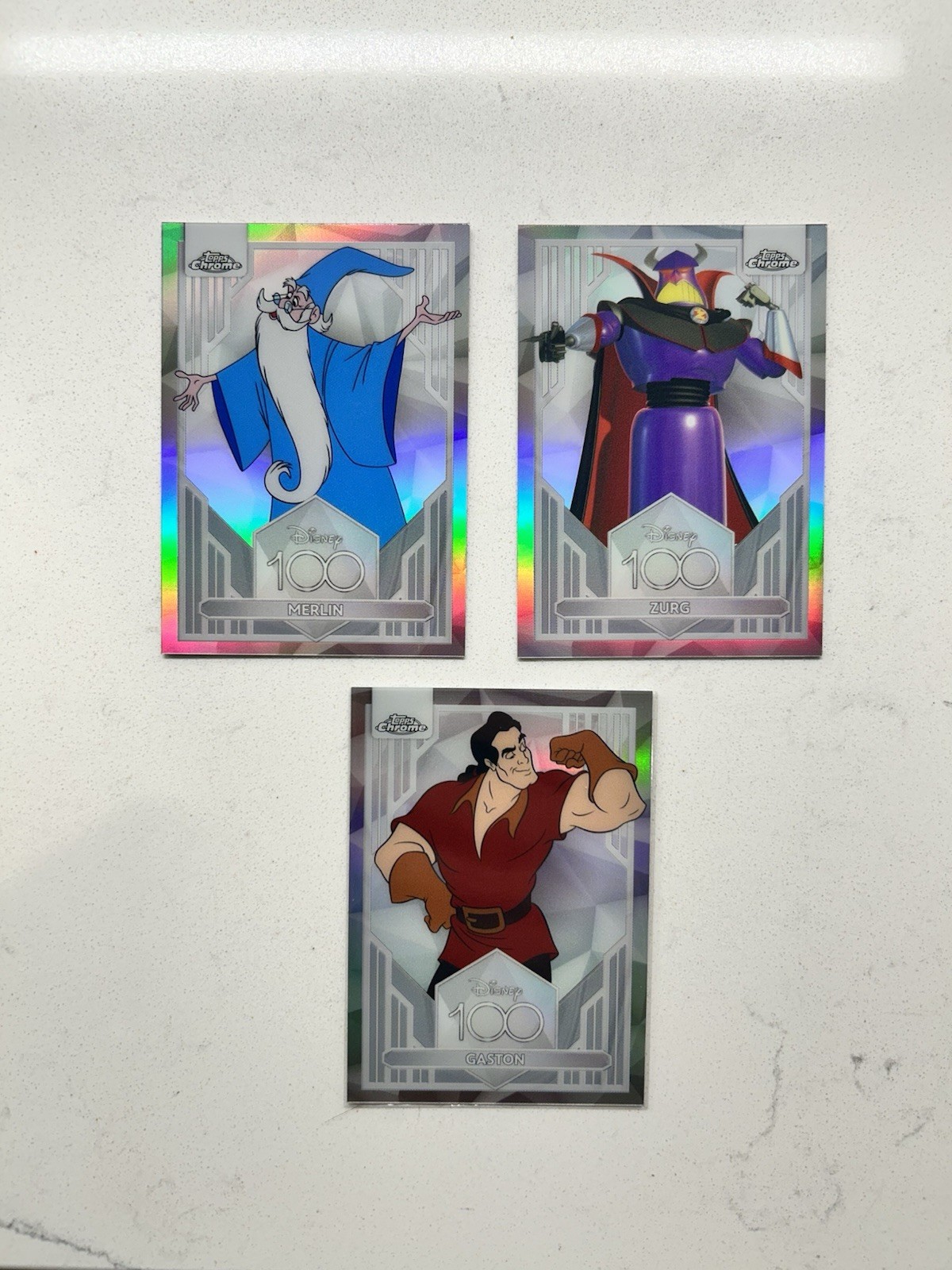 2023 Topps Chrome Disney 100 Years Refractor 3 Card Lot Zurg Merlin Gaston 2023 Topps Chrome Disney 100 Years Refractor 3 Card Lot Zurg Merlin Gaston