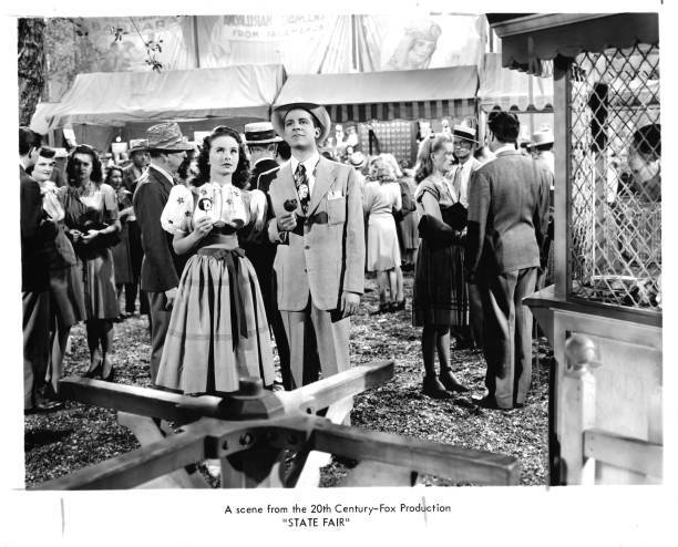 Jeanne Crain Dana Andrews fair holding a candy apple a scene film - Old Photo Jeanne Crain Dana Andrews fair holding a candy apple a scene film - Old Photo