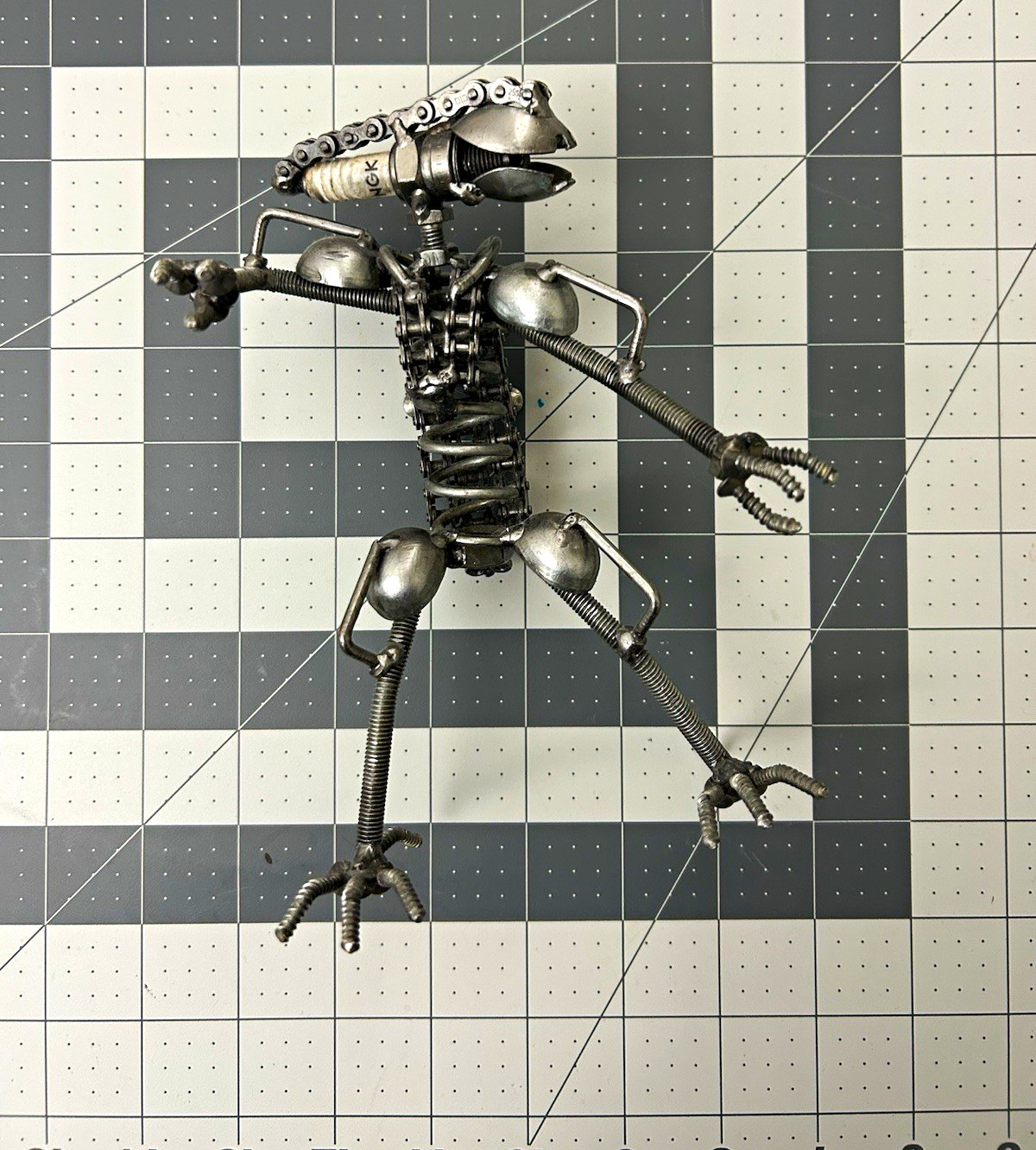 Hand-welded spark plug figure 1 of 1. 