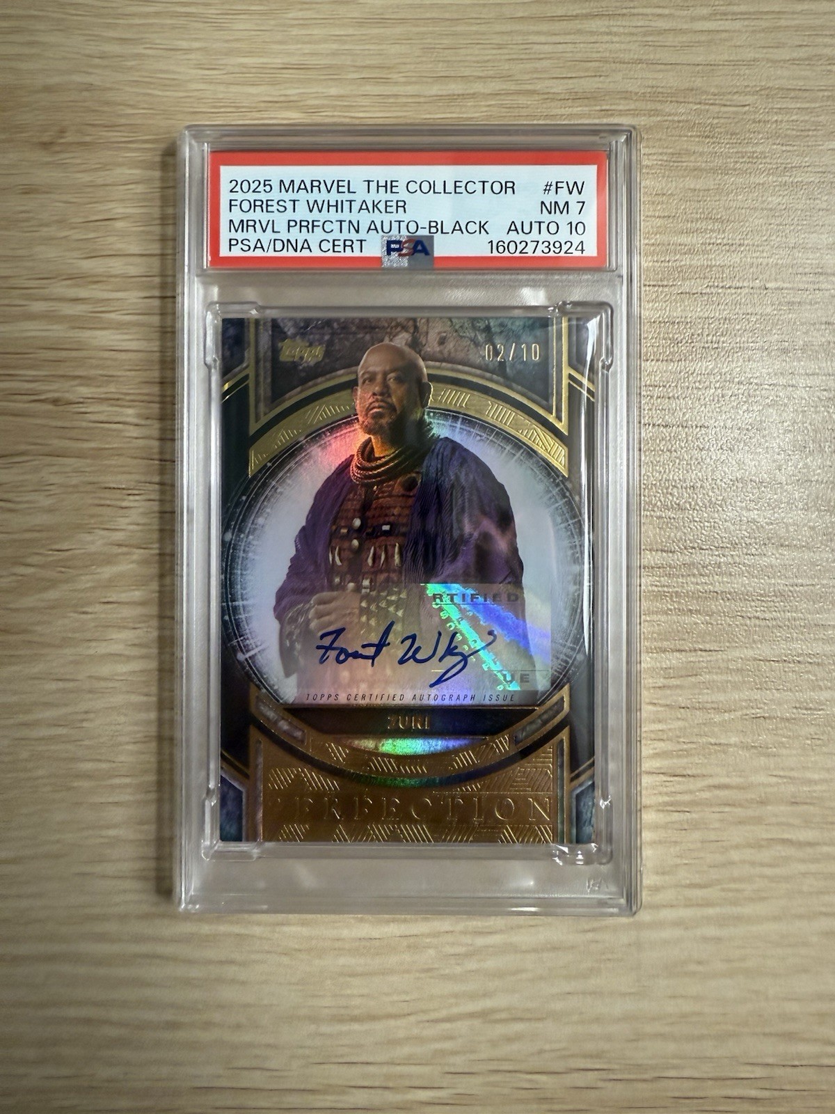 2025 Topps Marvel The Collector Zuri Auto (Forest Whittaker) PSA 7 10 Black /10 2025 Topps Marvel The Collector Zuri Auto (Forest Whittaker) PSA 7 10 Black /10