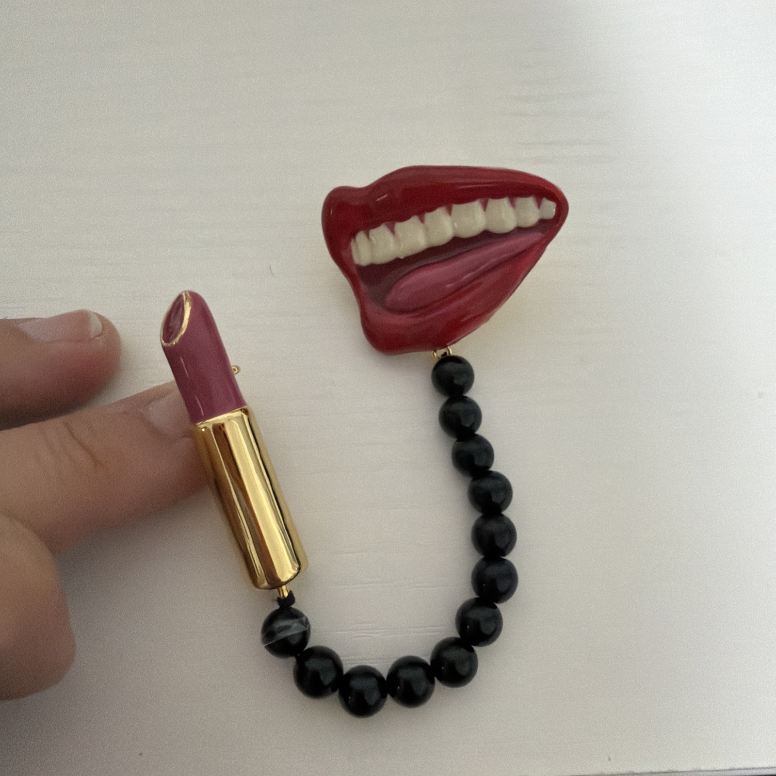 Coach Clip Mouth & Lipstick Red/ Pin/ Black Coach Clip Mouth & Lipstick Red/ Pin/ Black