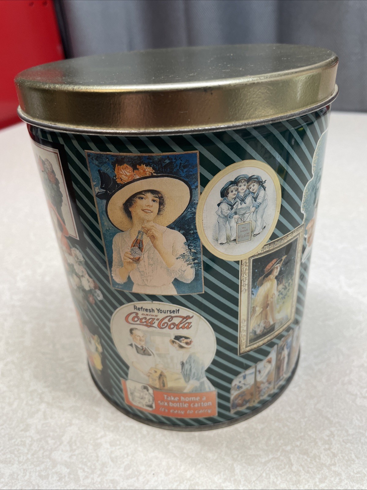 Vintage 1990's Coca Cola 5₵ Cent Round Advertising Coke Tin 6.5" Tall x 5" Diam. Vintage 1990's Coca Cola 5₵ Cent Round Advertising Coke Tin 6.5" Tall x 5" Diam.