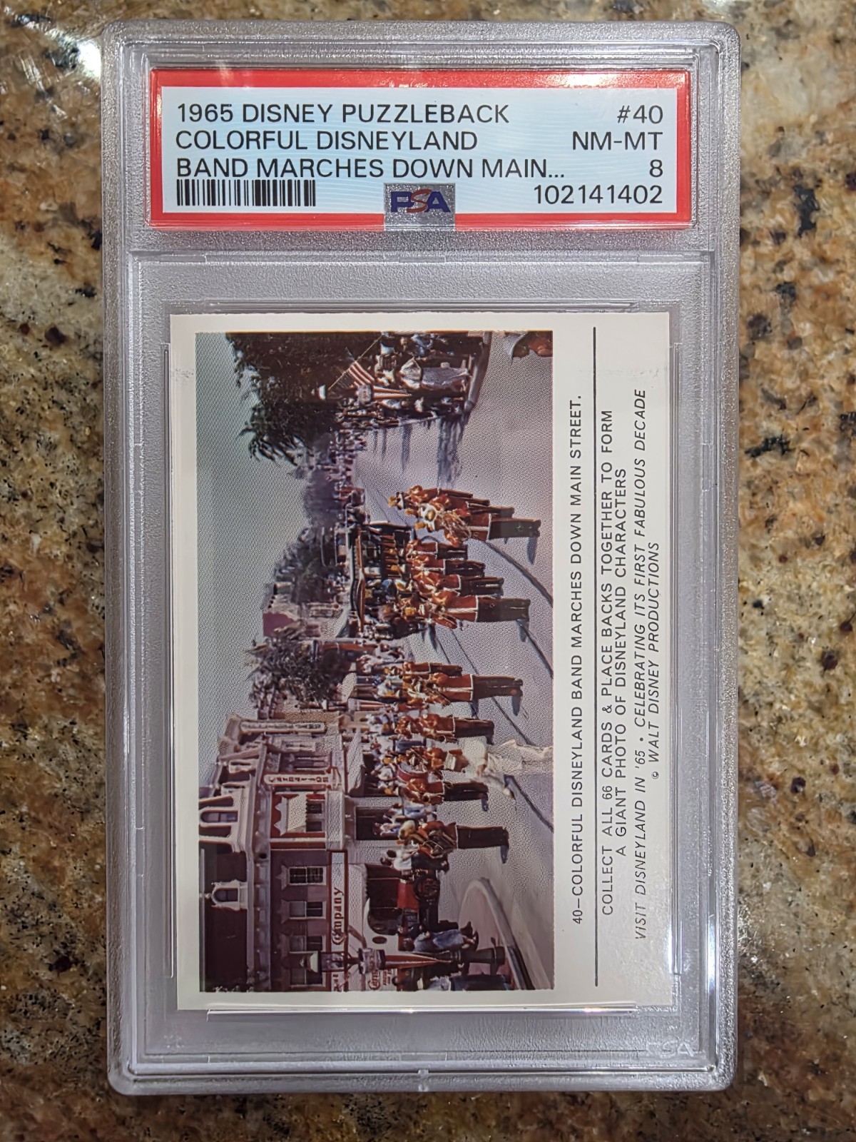 1965 DISNEYLAND PUZZLEBACK #40 Disney Colorful Disneyland Marches Down- PSA 8 1965 DISNEYLAND PUZZLEBACK #40 Disney Colorful Disneyland Marches Down- PSA 8