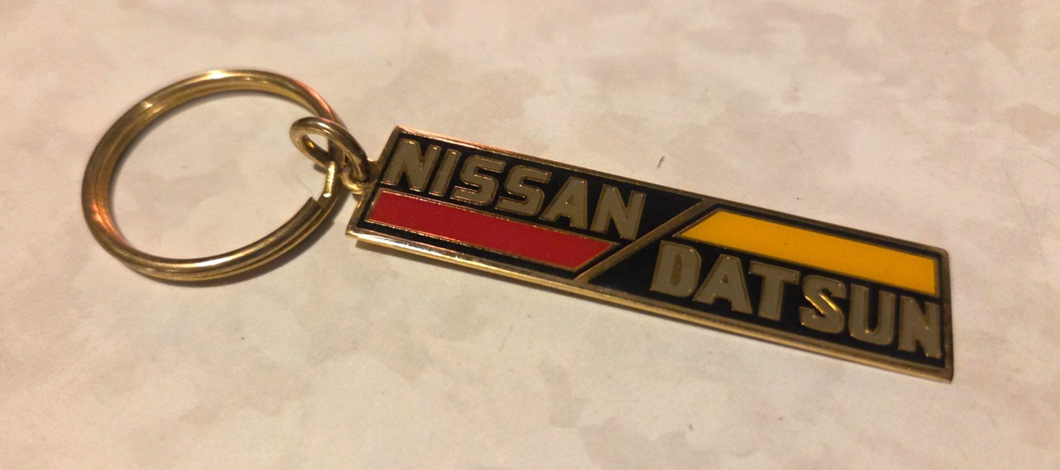 Vintage 1980s Keychain - Nissan Datsun - Cool Vintage 1980s Keychain - Nissan Datsun - Cool