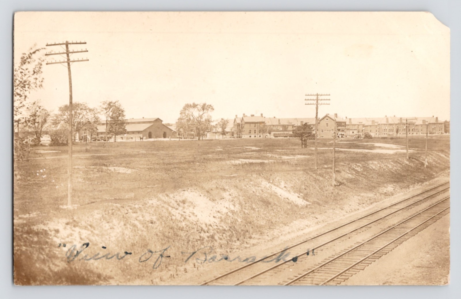 RPPC WWI View of Barracks from Train at Camp Pike Arkansas c1917 UNP Postcard 