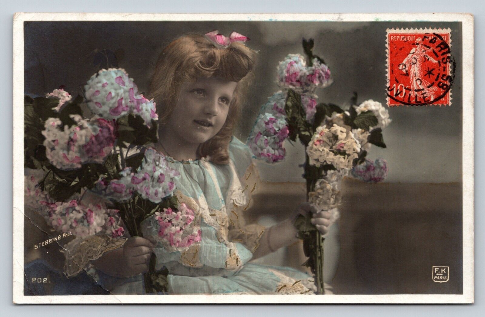 RPPC Young Girl Holding Flowers STEBBING Hand Color Tinted VINTAGE Postcard