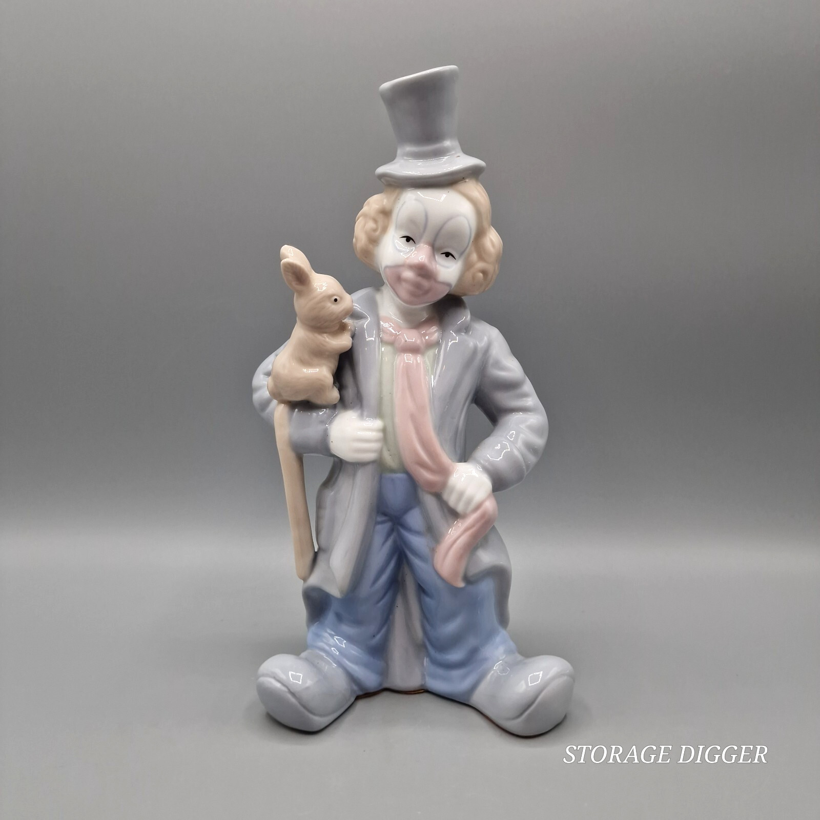 Vintage Blue Gray Brown Porcelain Clown with Rabbit Figurine 9.5" Tall Vintage Blue Gray Brown Porcelain Clown with Rabbit Figurine 9.5" Tall