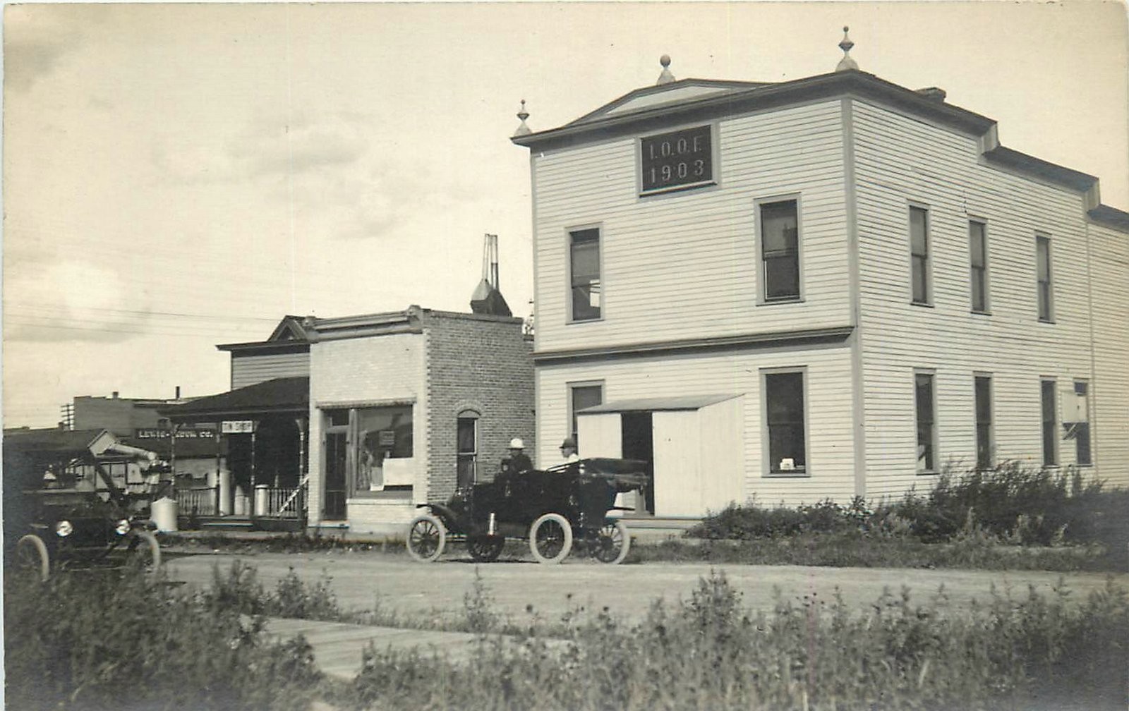 c1910 Glasgow Montana I.O.O.F. Building automobiles RPPC Postcard 25-0693 c1910 Glasgow Montana I.O.O.F. Building automobiles RPPC Postcard 25-0693