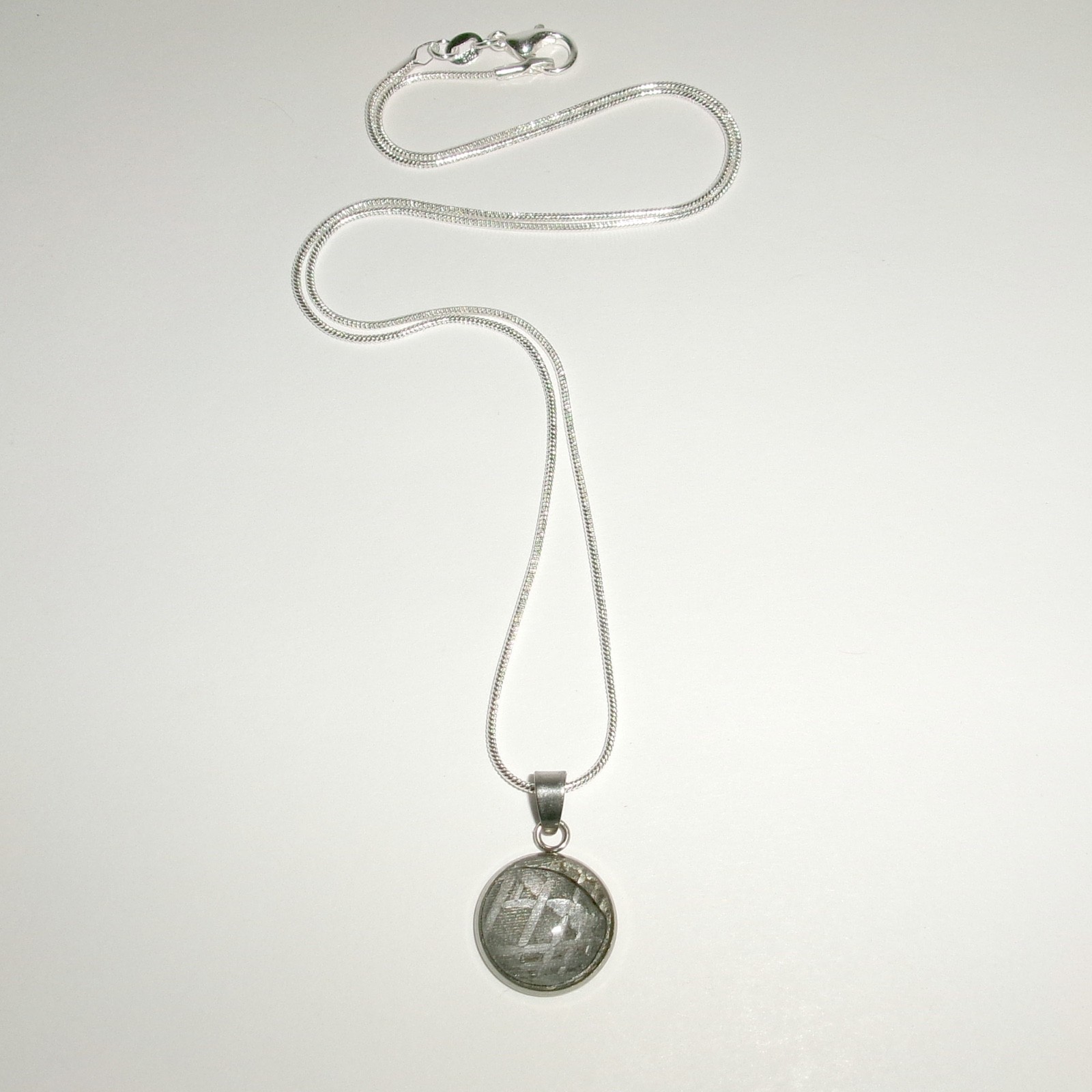 Genuine Meteorite Pendant and 20” Sterling Silver Necklace with COA Genuine Meteorite Pendant and 20” Sterling Silver Necklace with COA