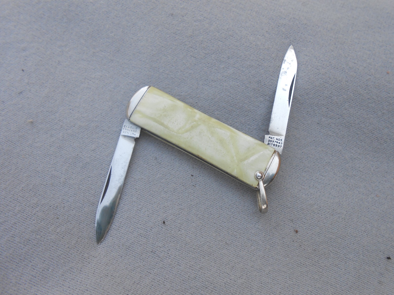 OLD VINTAGE PAT NOS 20379343 2170537 EQUAL END LOBSTER KNIFE KEYCHAIN OR FOB OLD VINTAGE PAT NOS 20379343 2170537 EQUAL END LOBSTER KNIFE KEYCHAIN OR FOB
