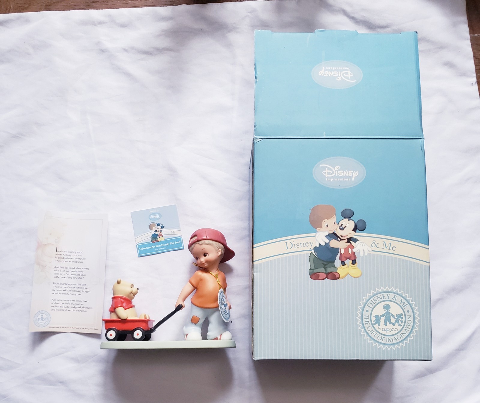 Disney Impressions Figurine by Enesco "Pooh and Boy with Wagon" 5 1/2" X 5" Disney Impressions Figurine by Enesco "Pooh and Boy with Wagon" 5 1/2" X 5"