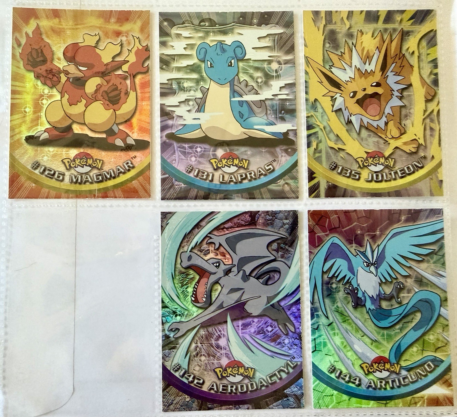 1999 Pokemon Rainbow Foil Blue Logo Topps TV Animation Edition Lot Lapras 1999 Pokemon Rainbow Foil Blue Logo Topps TV Animation Edition Lot Lapras