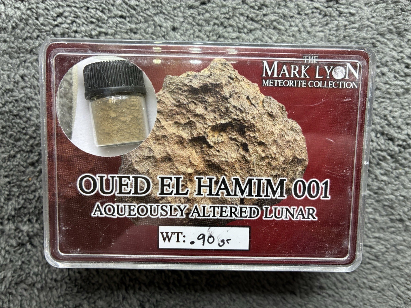 Authentic Oued El Hamim 001 Lunar Meteorite Vial (0.90g) – Mark Lyon Collection Authentic Oued El Hamim 001 Lunar Meteorite Vial (0.90g) – Mark Lyon Collection