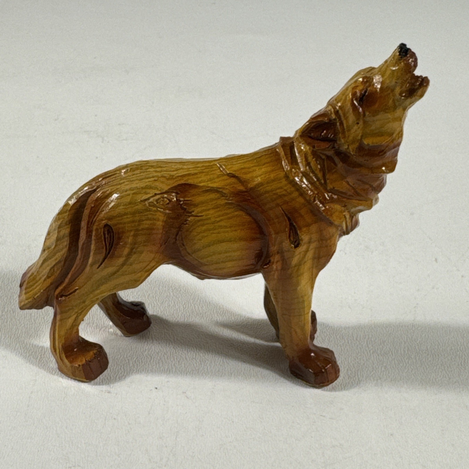 Ebros Howling Gray Wolf Faux Wood Figurines 3.5" tall x 4" wide Ebros Howling Gray Wolf Faux Wood Figurines 3.5" tall x 4" wide