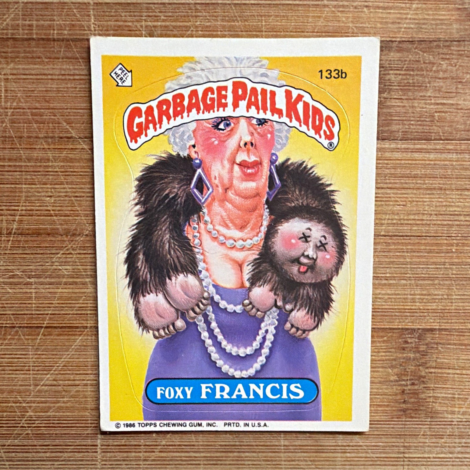 Topps Garbage Pail Kids Foxy Francis 133b 1986 Non-Sport Sticker Card Topps Garbage Pail Kids Foxy Francis 133b 1986 Non-Sport Sticker Card