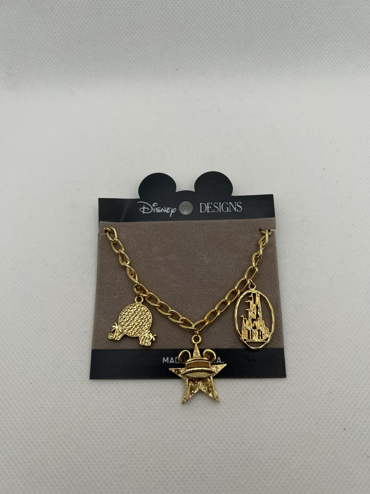Walt Disney World Gold Tone Charm Bracelet Disney Designs Made in USA Card Walt Disney World Gold Tone Charm Bracelet Disney Designs Made in USA Card
