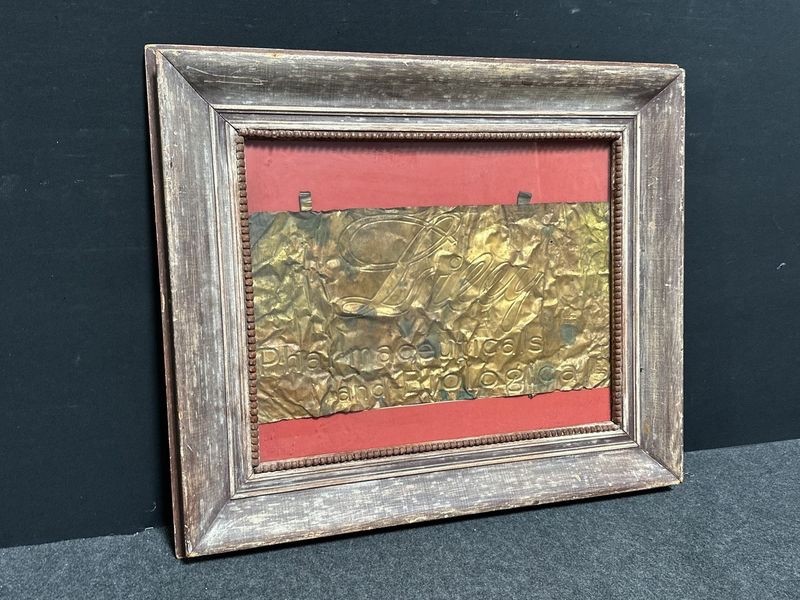 Vintage Lilly Pharmaceutical Embossed Brass Advertising Sign Plaque Framed 28x24 Vintage Lilly Pharmaceutical Embossed Brass Advertising Sign Plaque Framed 28x24