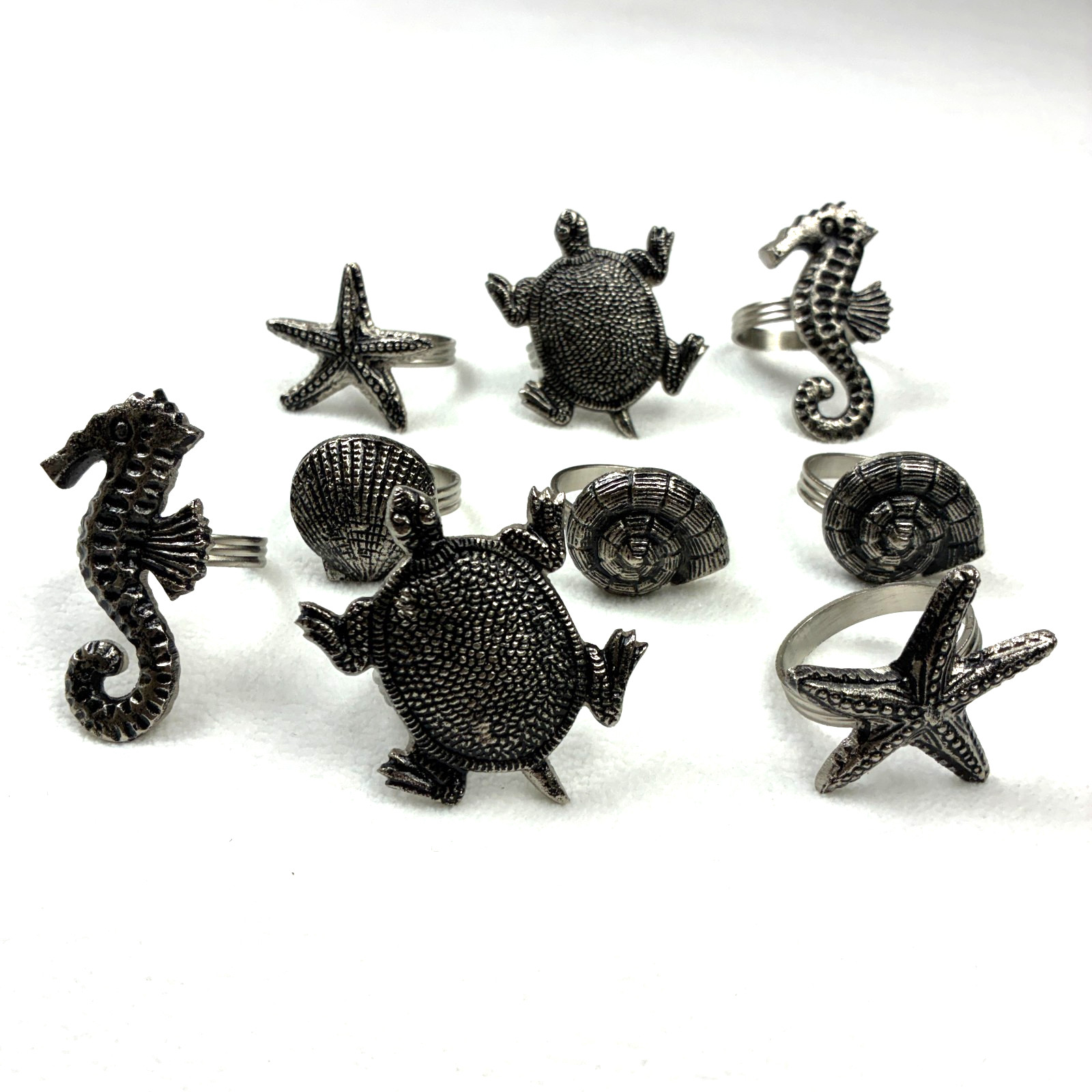 Set of 9 VTG Silver Tone Napkin Rings Holders Nautical Theme Sea Horse Turtles Set of 9 VTG Silver Tone Napkin Rings Holders Nautical Theme Sea Horse Turtles