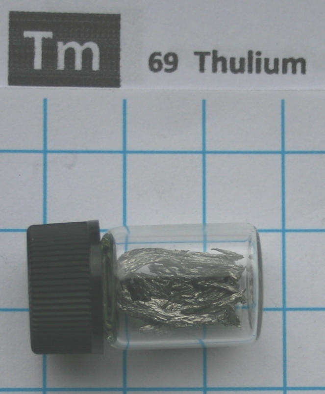1 gram 99.9% Thulium metal pieces in glass vial element 69 sample 1 gram 99.9% Thulium metal pieces in glass vial element 69 sample