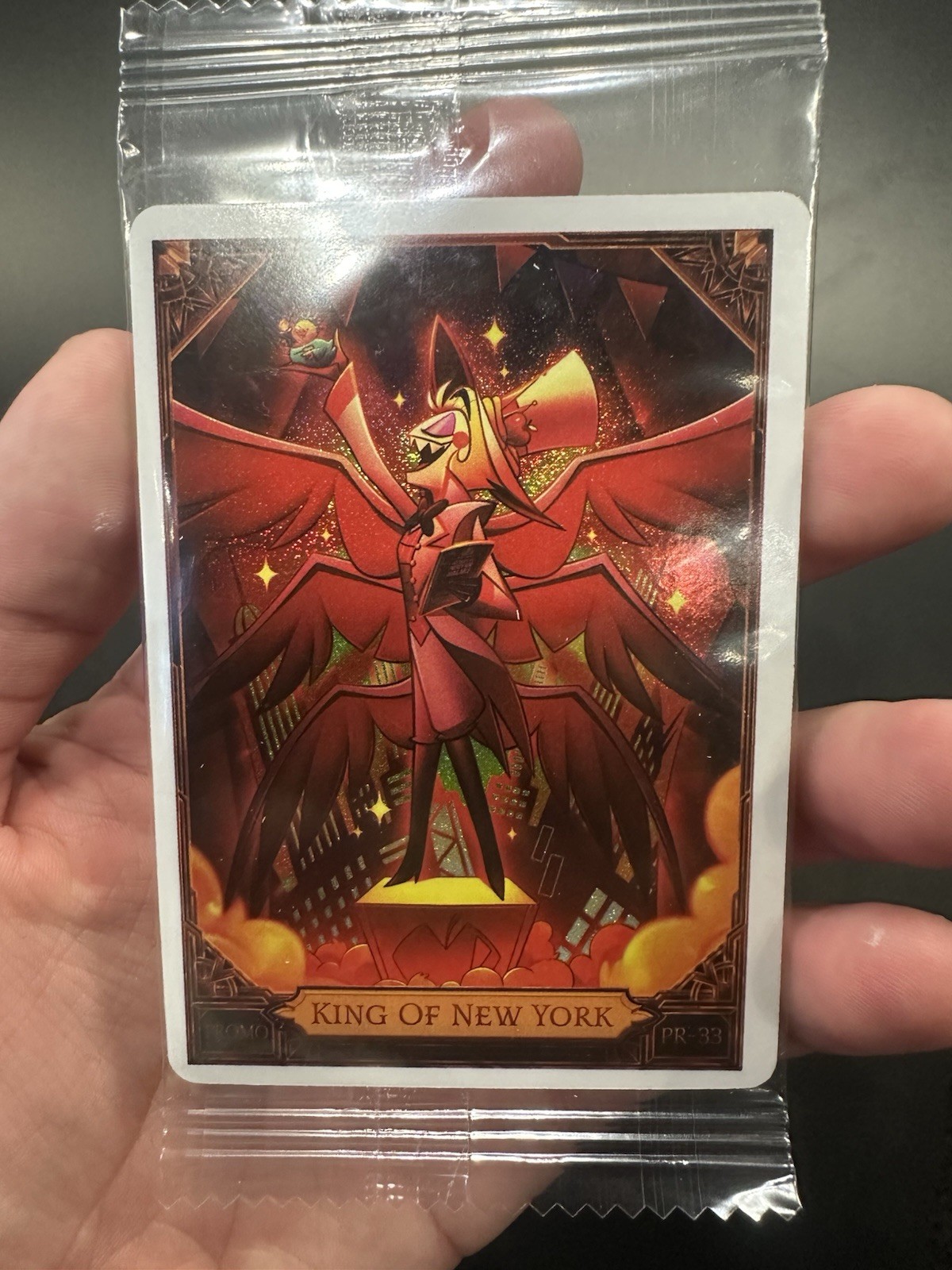 NYCC 2026 PSA HAZBIN HOTEL LUCIFER KING OF NEW YORK PROMO CARD IN HAND NYCC 2026 PSA HAZBIN HOTEL LUCIFER KING OF NEW YORK PROMO CARD IN HAND
