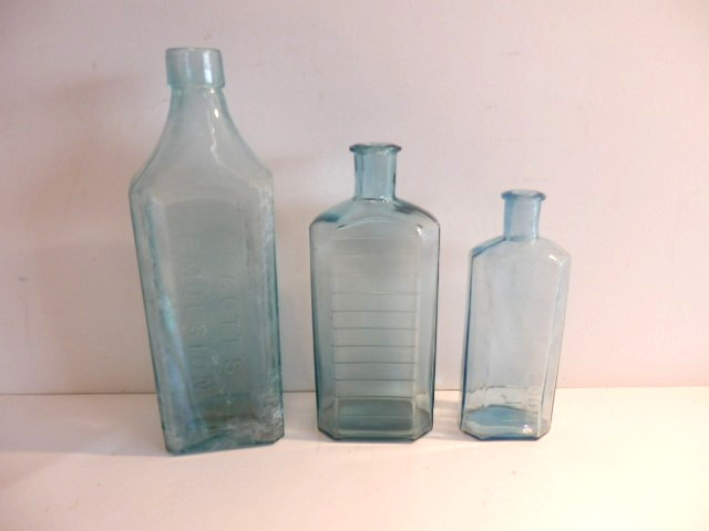 Three Vintage Aqua-Tinted Glass Medicine Apothecary Bottles Three Vintage Aqua-Tinted Glass Medicine Apothecary Bottles