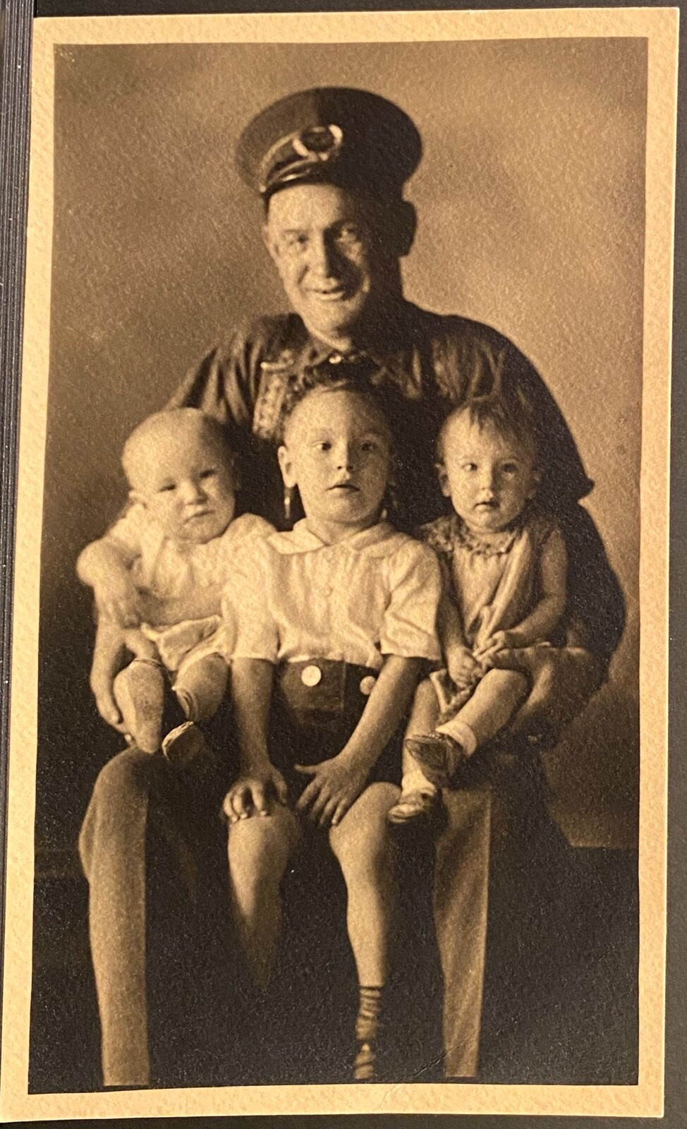 Three Children Crowded on Lap of Grandpa Wearing Uniform Hat~Old Photo Three Children Crowded on Lap of Grandpa Wearing Uniform Hat~Old Photo