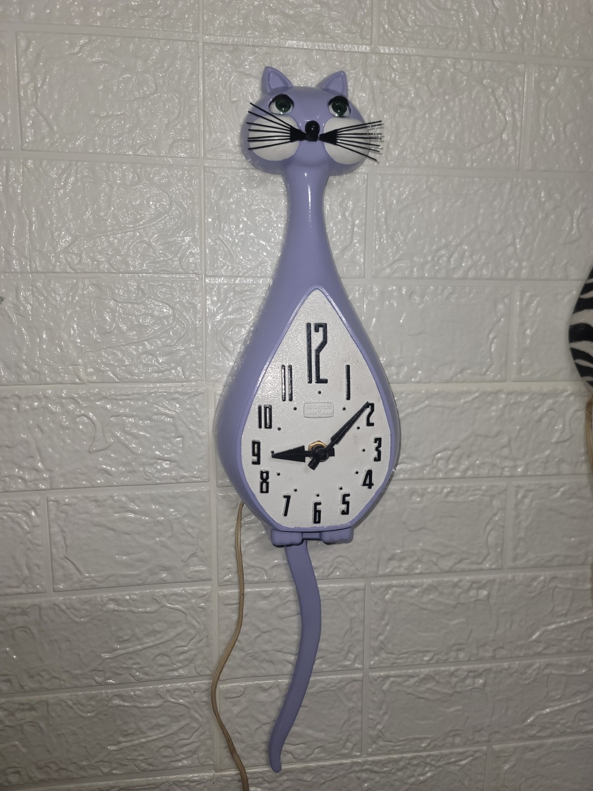 Rare 50s/60s Spartus Here Kitty Purple Inviolet Kitty clock. Working tail/eyes. Rare 50s/60s Spartus Here Kitty Purple Inviolet Kitty clock. Working tail/eyes.