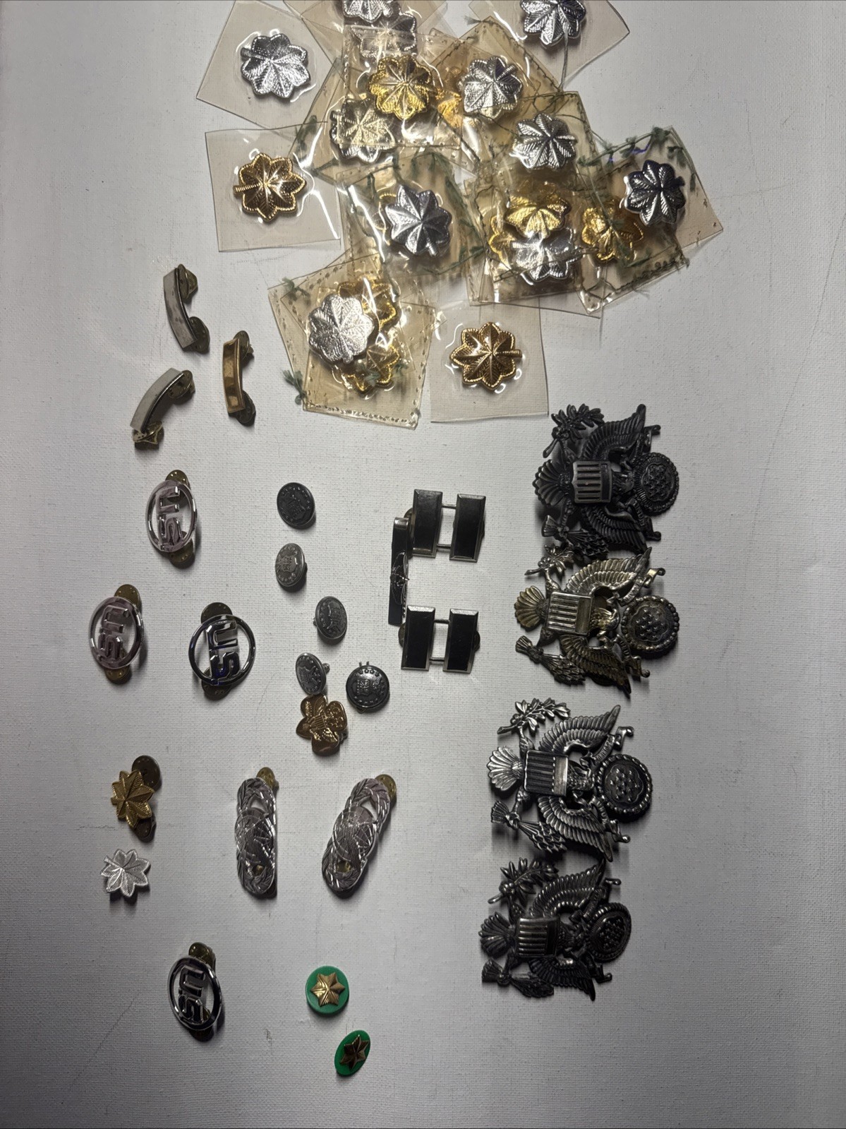 Huge US Military Insignia Lot - Officer Cap Eagles Captain Bars Oak Leaf Pins Huge US Military Insignia Lot - Officer Cap Eagles Captain Bars Oak Leaf Pins