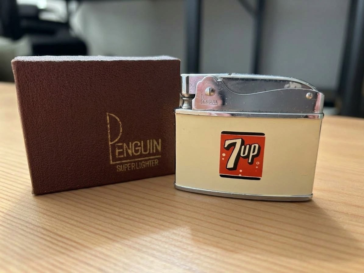 Vintage NOS Penguin 7Up Flat Advertising Lighter - Cream Enamel w/ Original Box Vintage NOS Penguin 7Up Flat Advertising Lighter - Cream Enamel w/ Original Box