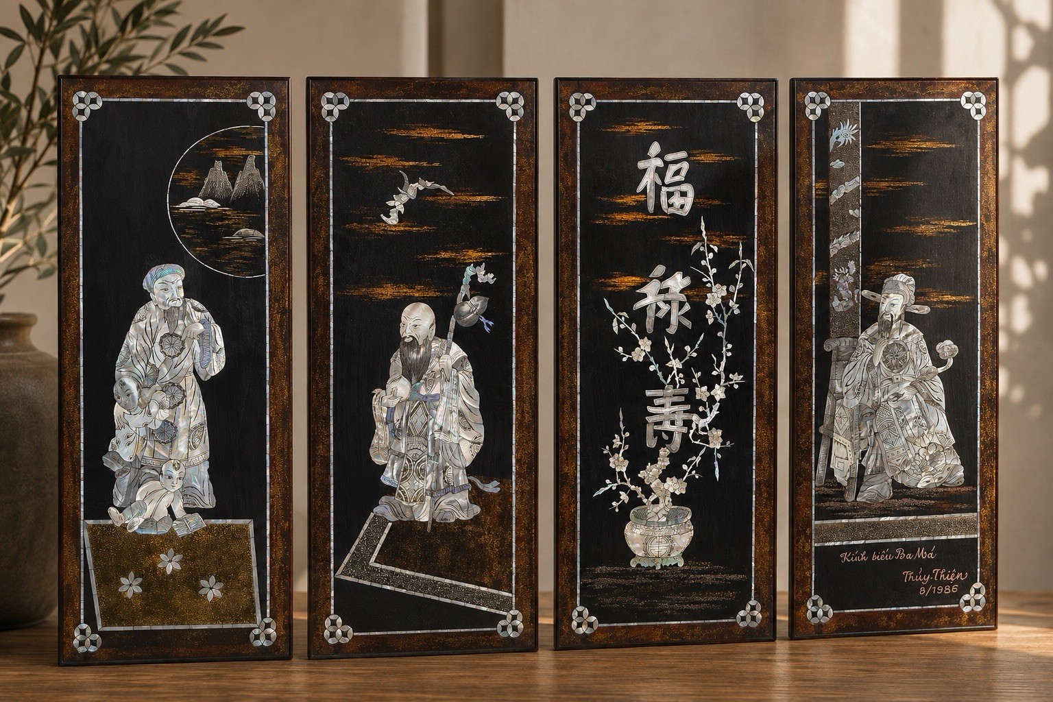 This vintage set of four black lacquer and mother-of-pearl Plagues This vintage set of four black lacquer and mother-of-pearl Plagues