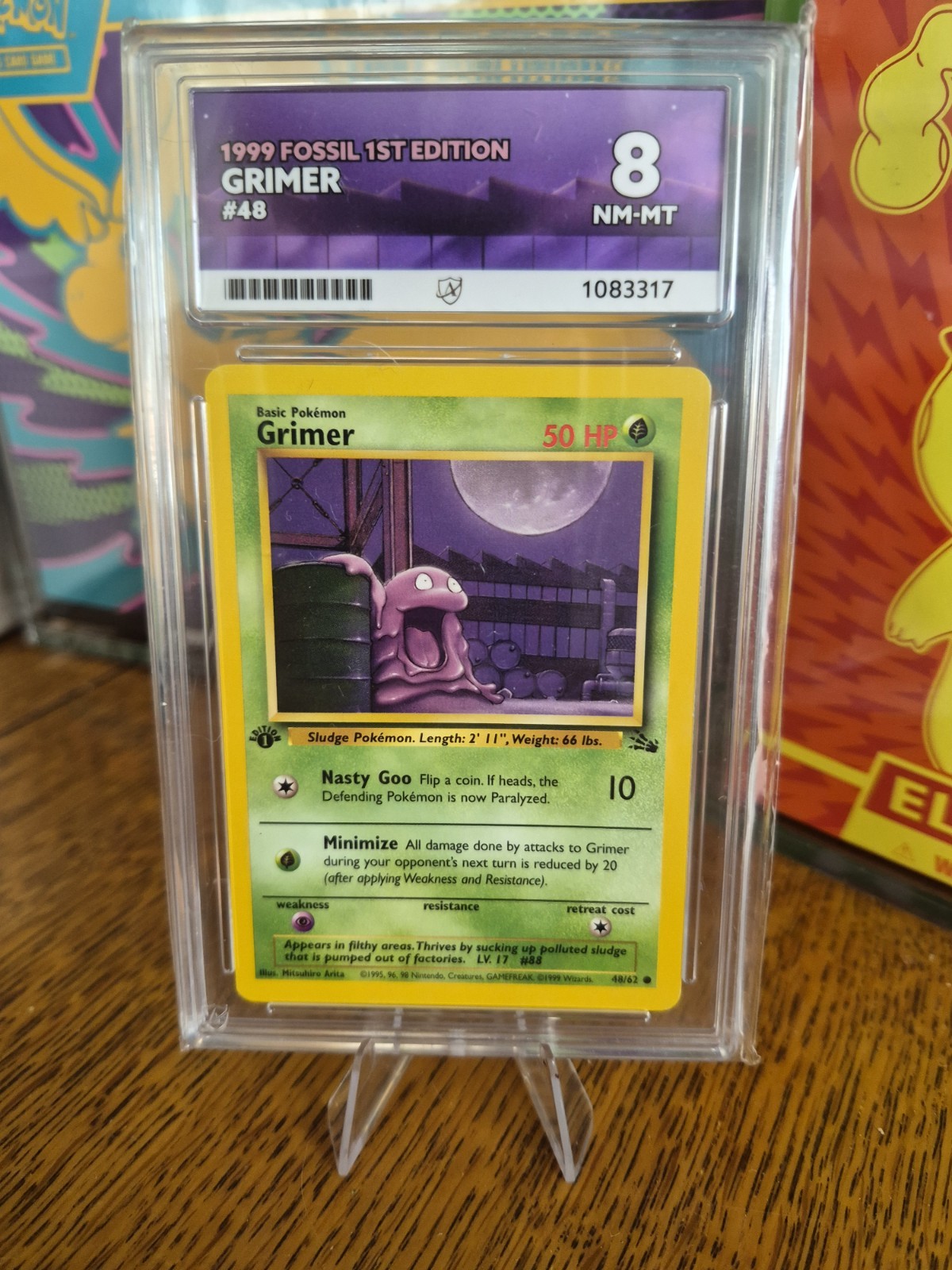 vintage 1999 Pokémon Fossil 1st Edition Grimer card (#48/62) POP 6 Ace Grade 8 vintage 1999 Pokémon Fossil 1st Edition Grimer card (#48/62) POP 6 Ace Grade 8