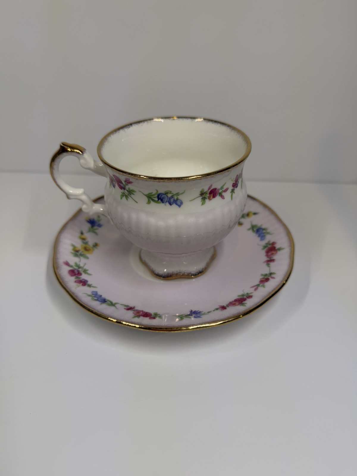 Vintage Elizabethan Fine Bone China- Floral England. Footed Tea Cup and Saucer. Vintage Elizabethan Fine Bone China- Floral England. Footed Tea Cup and Saucer.