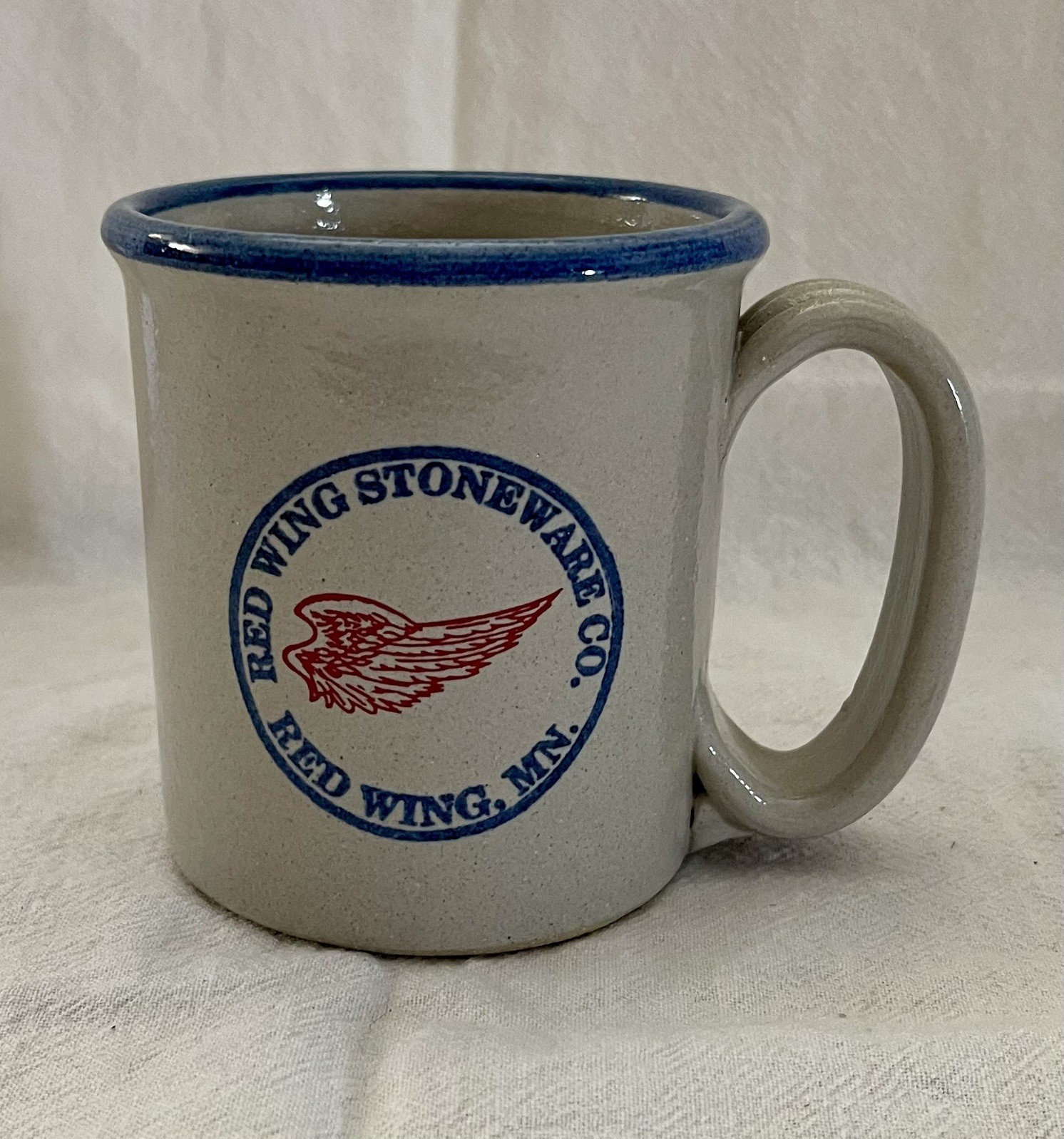 Red Wing Stoneware Co Coffee Mug, Red Wing Minnesota. Gray With Blue Rim. Red Wing Stoneware Co Coffee Mug, Red Wing Minnesota. Gray With Blue Rim.
