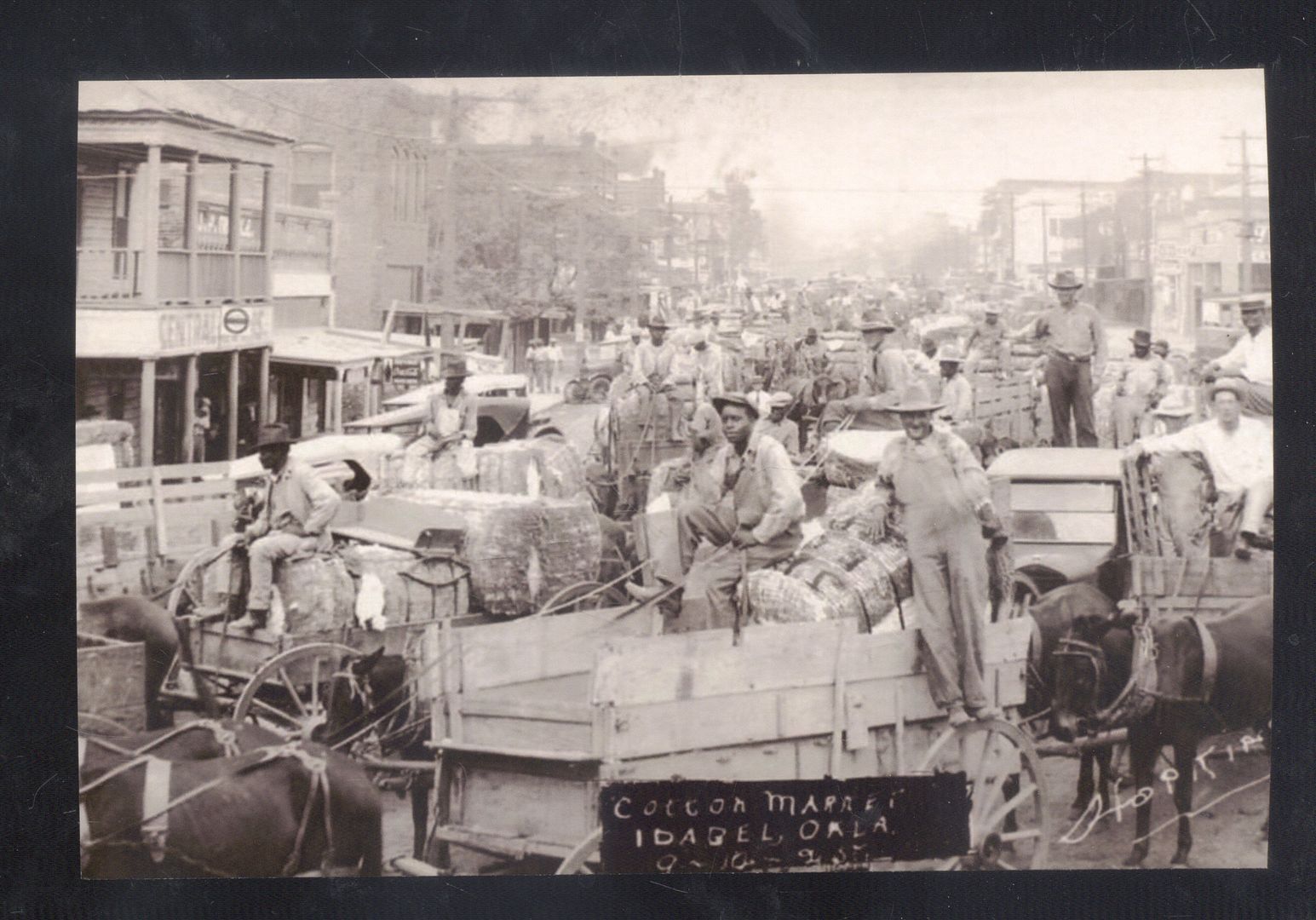 REAL PHOTO IDABEL OKLAHOMA DOWNTOWN STREET SCENE COTTON MARKET POSTCARDE COPY REAL PHOTO IDABEL OKLAHOMA DOWNTOWN STREET SCENE COTTON MARKET POSTCARDE COPY