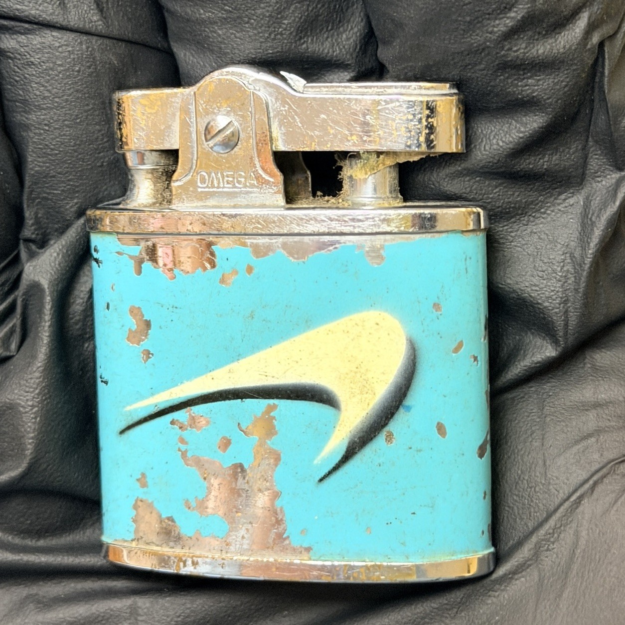Vintage 1950s-1960s "Spinnaker Swoosh" Lighter, Promotional Logo For Newport. On Vintage 1950s-1960s "Spinnaker Swoosh" Lighter, Promotional Logo For Newport. On