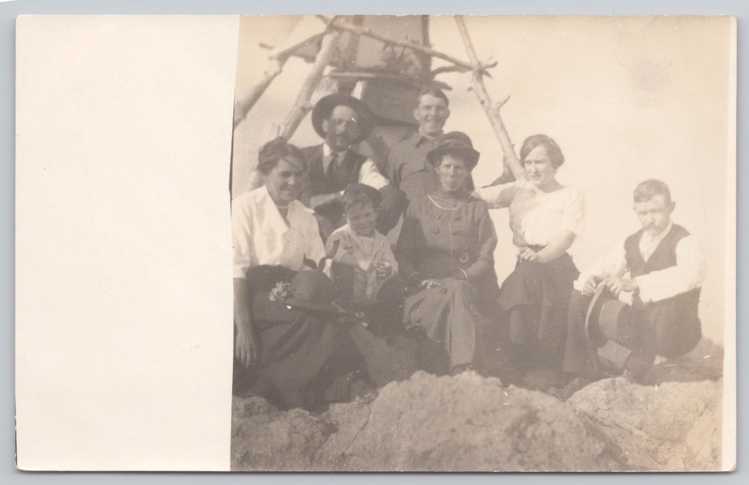 Vintage RPPC Postcard Group of 7 People Outdoors Wooden Structure c. 1910s AZO Vintage RPPC Postcard Group of 7 People Outdoors Wooden Structure c. 1910s AZO